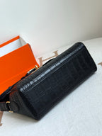 Hermes croc-textured belt bag, dark blue with gold hardware, long strap