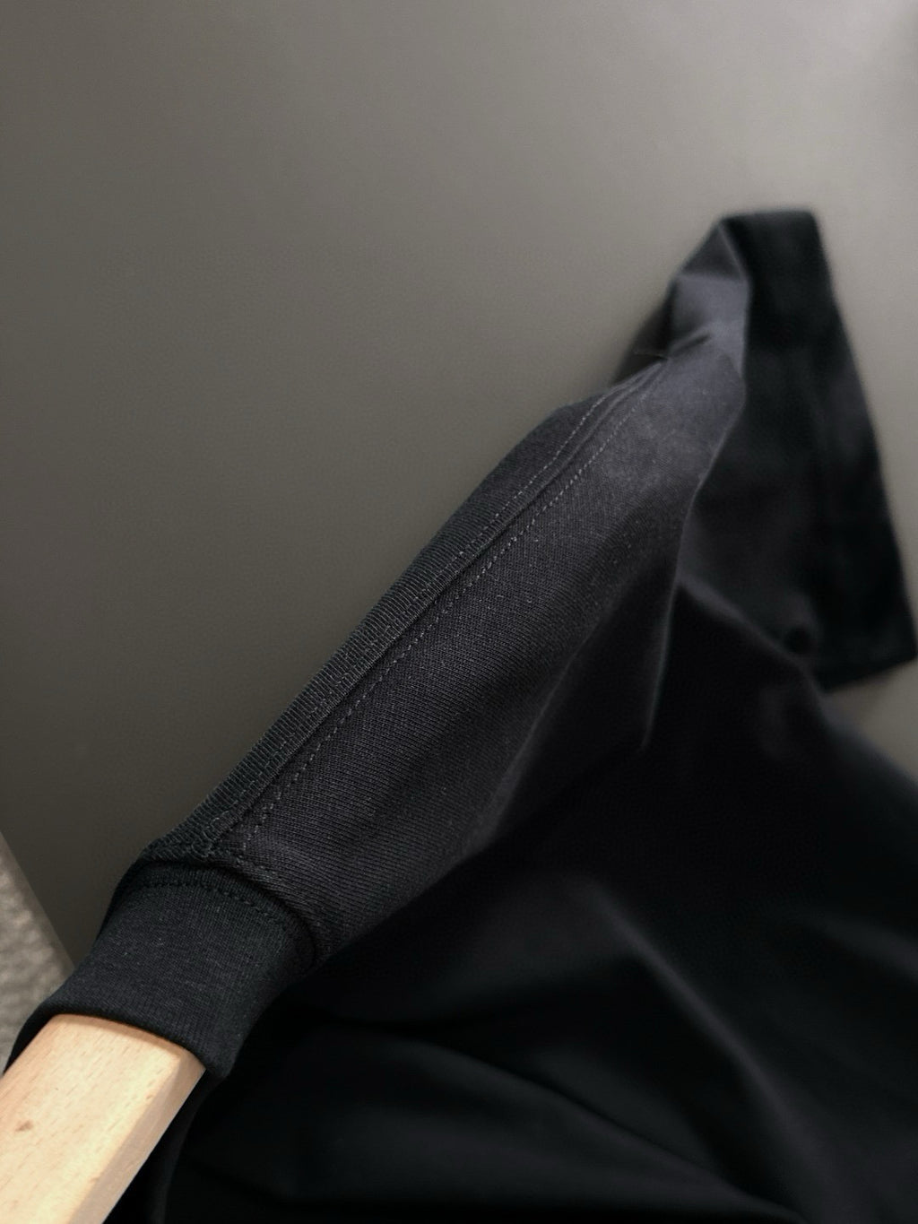 Black T-shirt sleeve with ribbed cuff