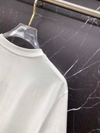 White T-shirt neckline close-up with crew neck stitching
