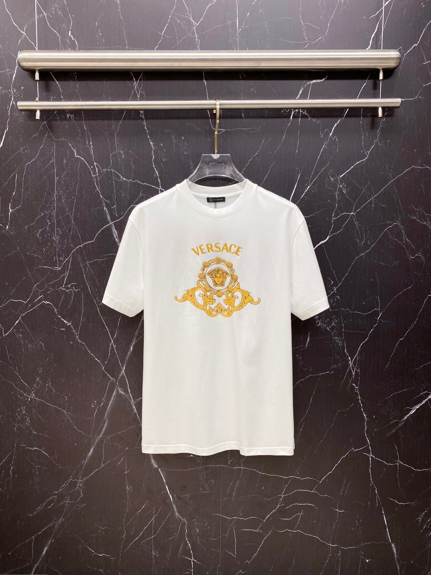 White Versace T-shirt with gold logo crest and lettering at chest