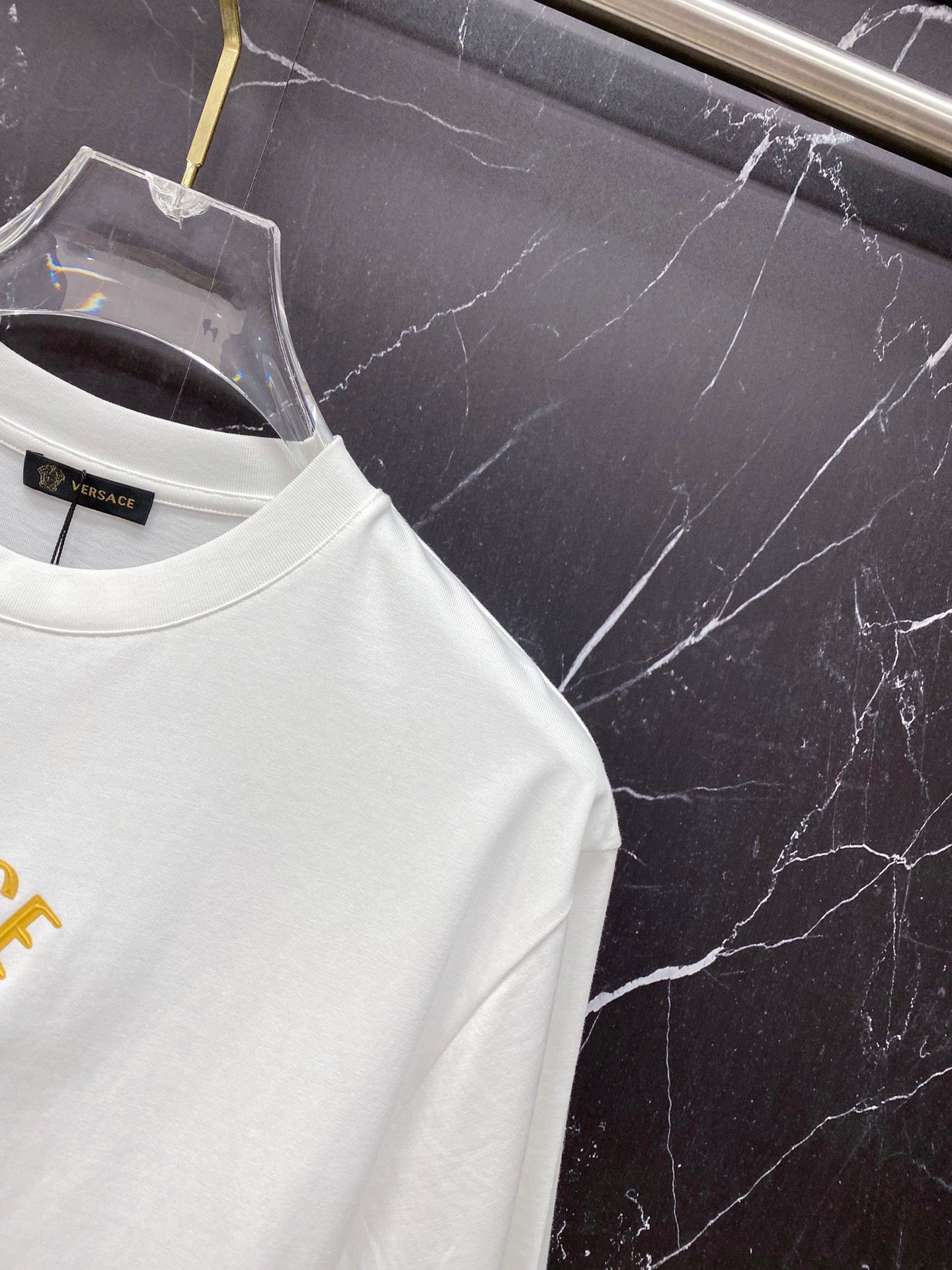White T-shirt with partial gold VERSACE logo print, crew neck