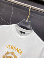 White T-shirt crew neck with gold Versace text print