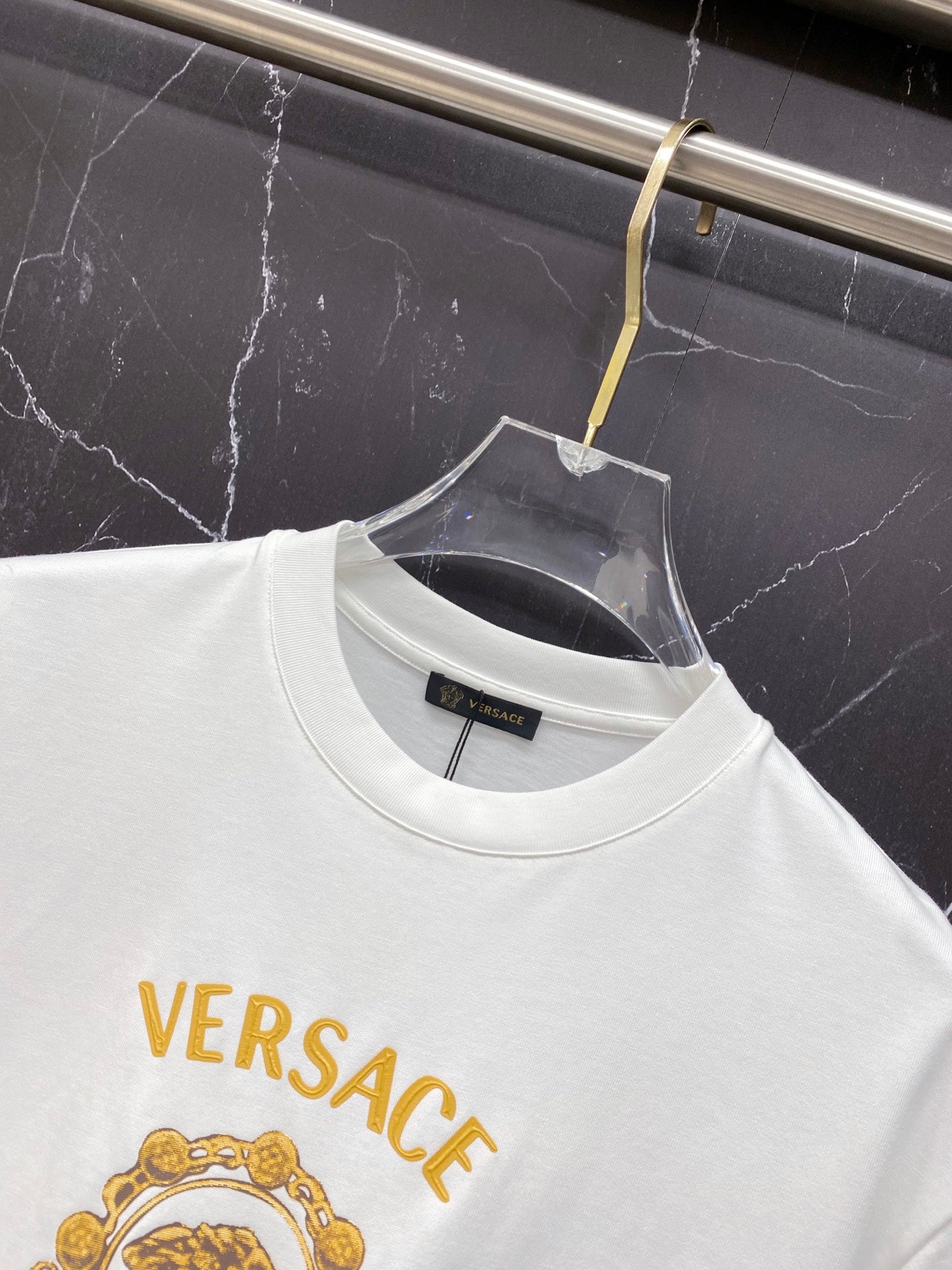 White T-shirt crew neck with gold Versace text print