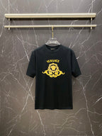Black Versace T-shirt with gold logo print on chest.