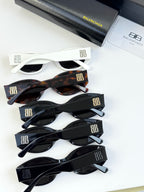 Sunglasses set with multiple frames: white, tortoiseshell, and black pairs