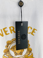 White T-shirt with attached black Versace neck tag