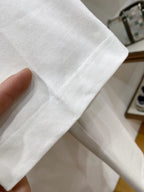 White T-shirt sleeve cuff and fabric texture close-up
