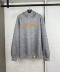 Gray marl hoodie with yellow embroidered script logo, pullover hood, and front pouch pocket