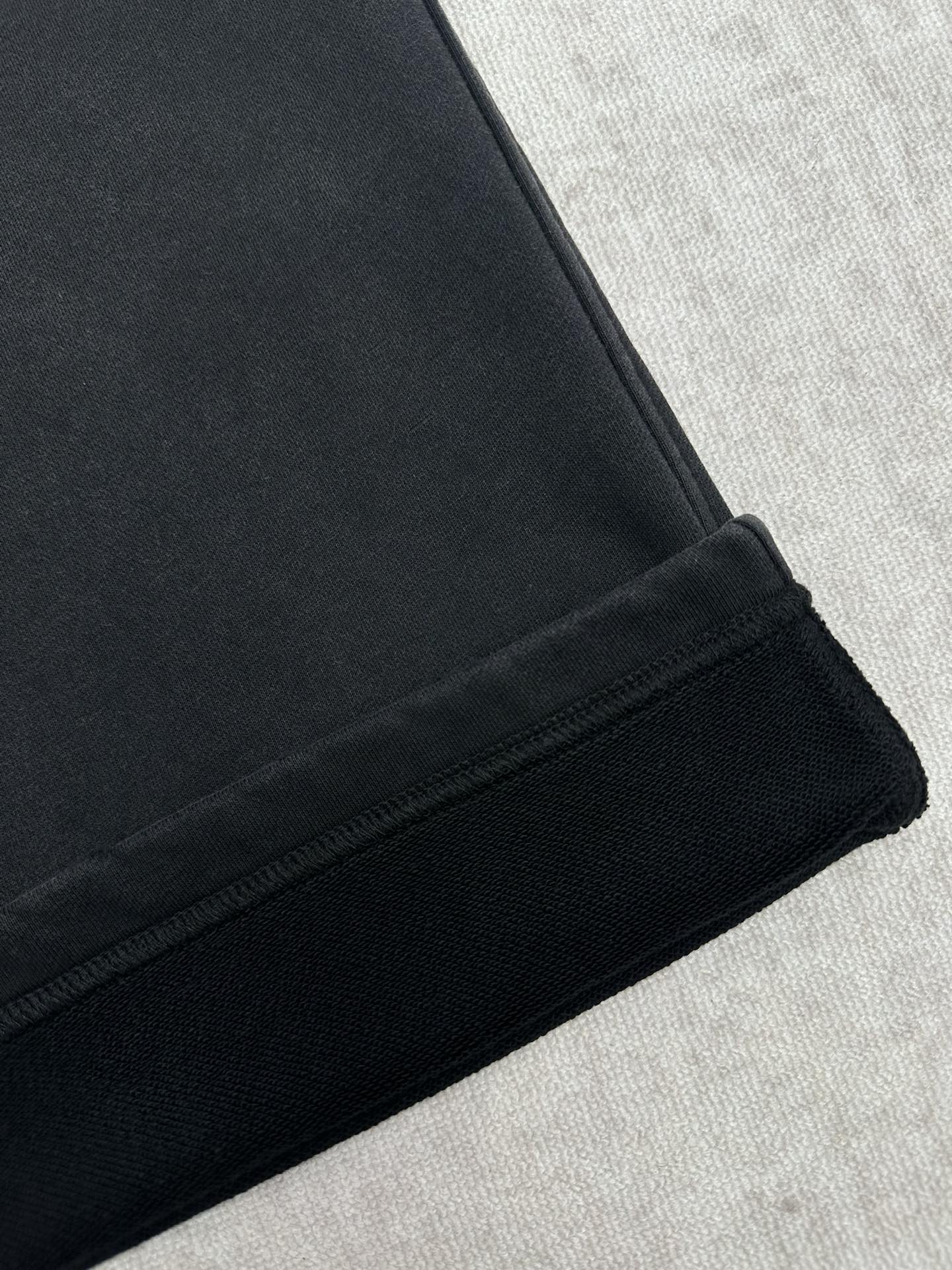 Balenciaga dark pants with ribbed inner hem detail