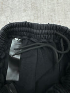Balenciaga dark pants with drawstring and elastic waistband, with tag