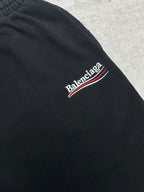 Balenciaga dark pants with embroidered Balenciaga logo on side
