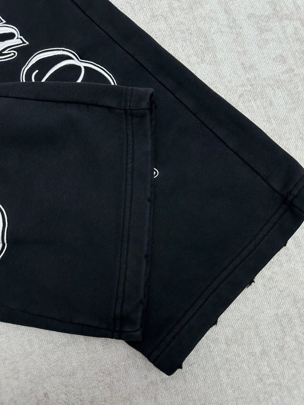 Black Balenciaga pants cuff with side seam and relaxed tapered leg