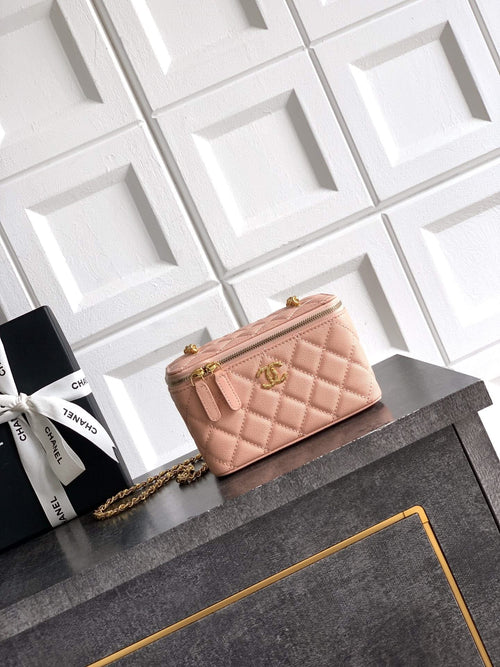 Chanel bag in light pink quilted leather with gold chain strap and top zip