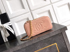 Chanel bag in light pink leather with embossed CC logo and gold chain strap