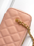 Chanel bag in light pink textured leather with gold chain strap and CC charm