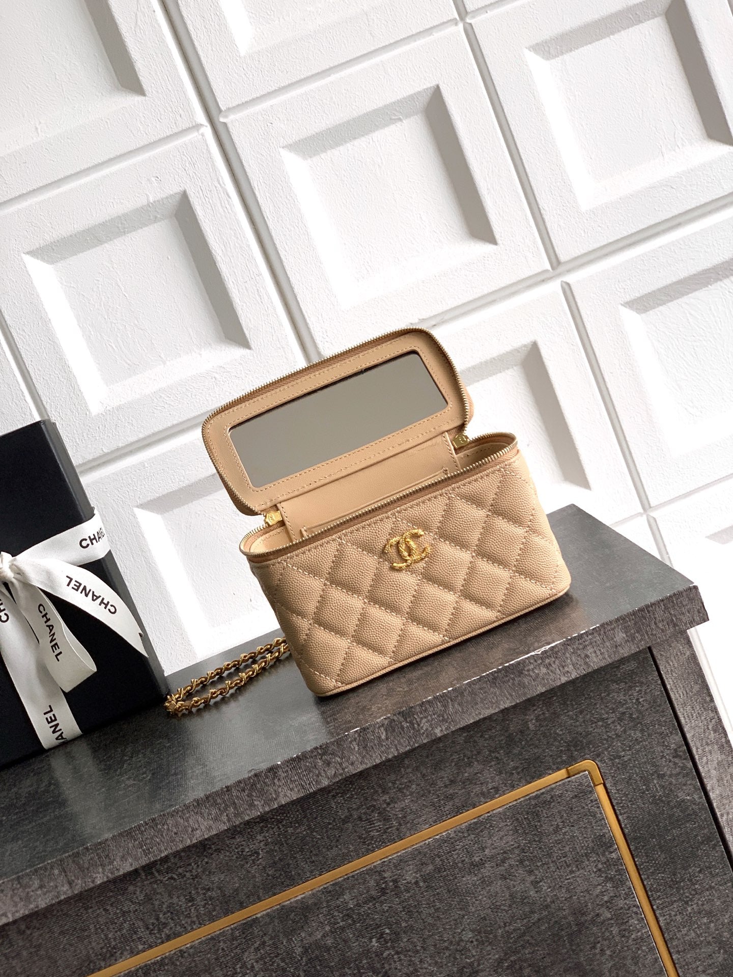 Chanel quilted mini bag with gold chain strap, beige, open top with card slots