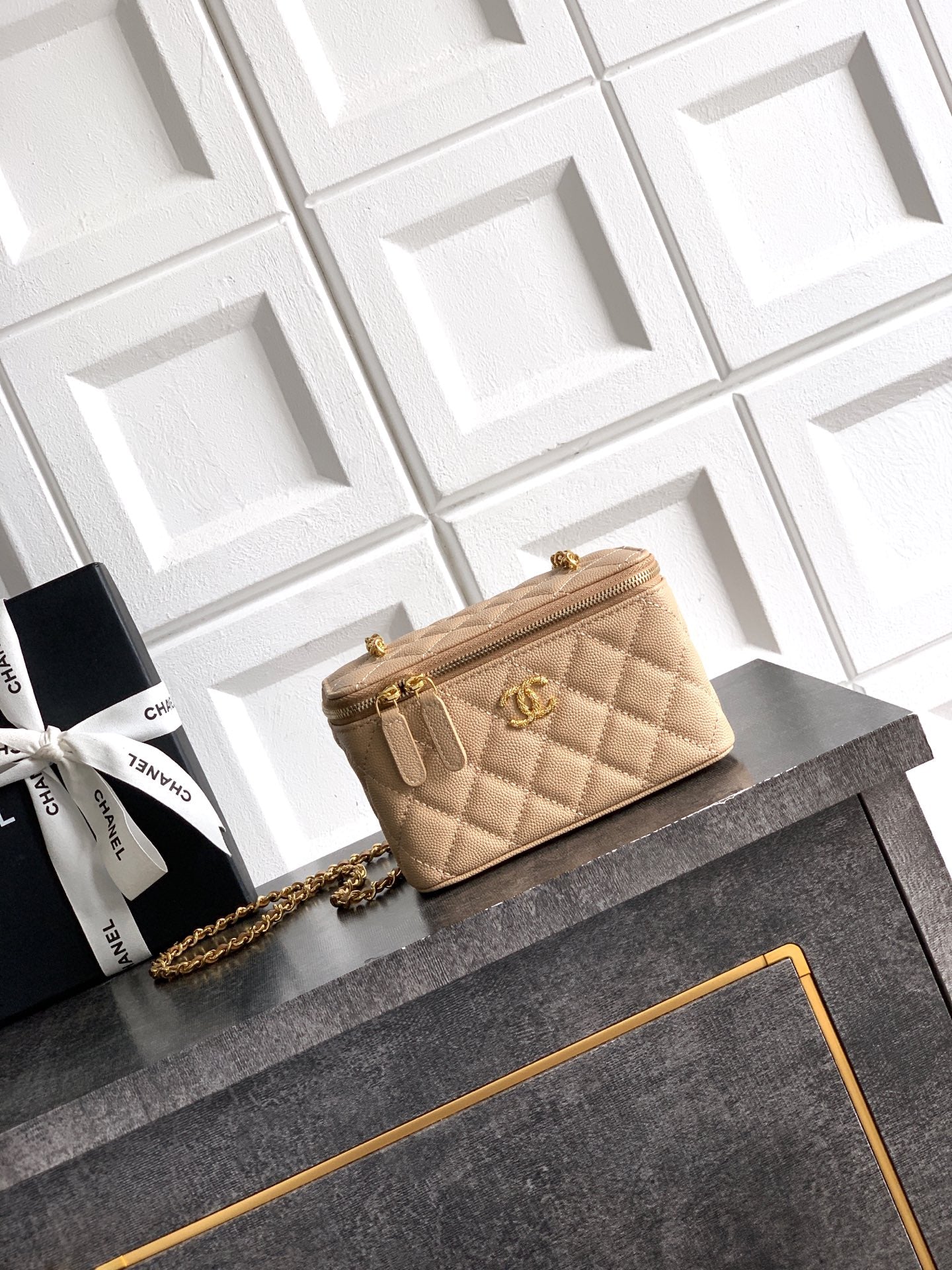 Chanel quilted leather mini bag with gold chain strap, beige, front flap closure