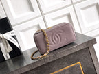 Lilac quilted Chanel mini bag with embossed CC logo and gold-tone chain