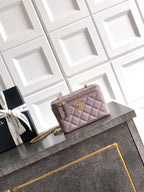 Chanel lilac quilted flap bag with gold-tone chain strap and front clasp