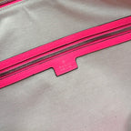 Gucci duffel bag zipper area with pink lining and small fabric logo label