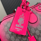Gucci duffel bag luggage tag with embossed rider emblem, pink leather