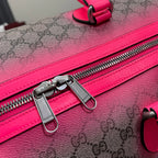 Gucci duffel bag zipper track with metal pull hardware and pink leather edging