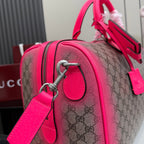 Gucci bag corner view with pink leather trim, GG canvas, and silver hardware