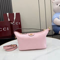 Pink mini shoulder bag with monogram texture and top handle