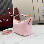 Light pink mini hobo bag with adjustable strap and gold-toned hardware
