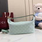 Gucci hobo bag light blue GG monogram with gold zipper hardware and top handle ring