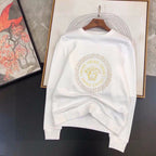 White sweatshirt with gold Medusa emblem print and ribbed crewneck cuffs