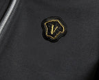 Black track jacket emblem patch on chest