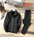 Black zip-up track jacket and cuffed jogger pants set
