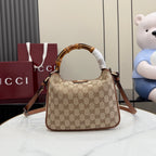 Gucci hobo bag in tan GG canvas with brown leather trim and top handle