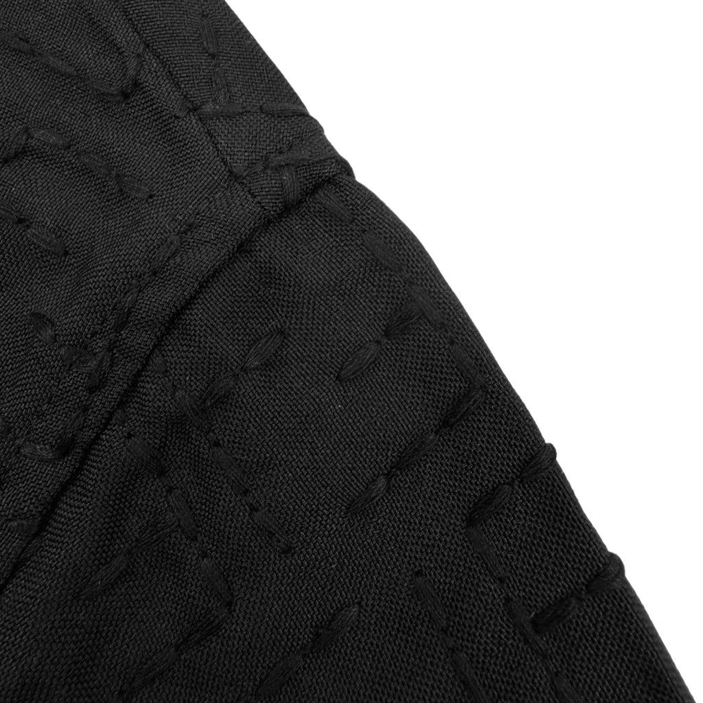 Fendi short-sleeve shirt sleeve cuff close-up in dark black with jacquard texture