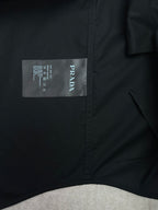 Long-sleeve button-up shirt with Prada neck size label on inside collar