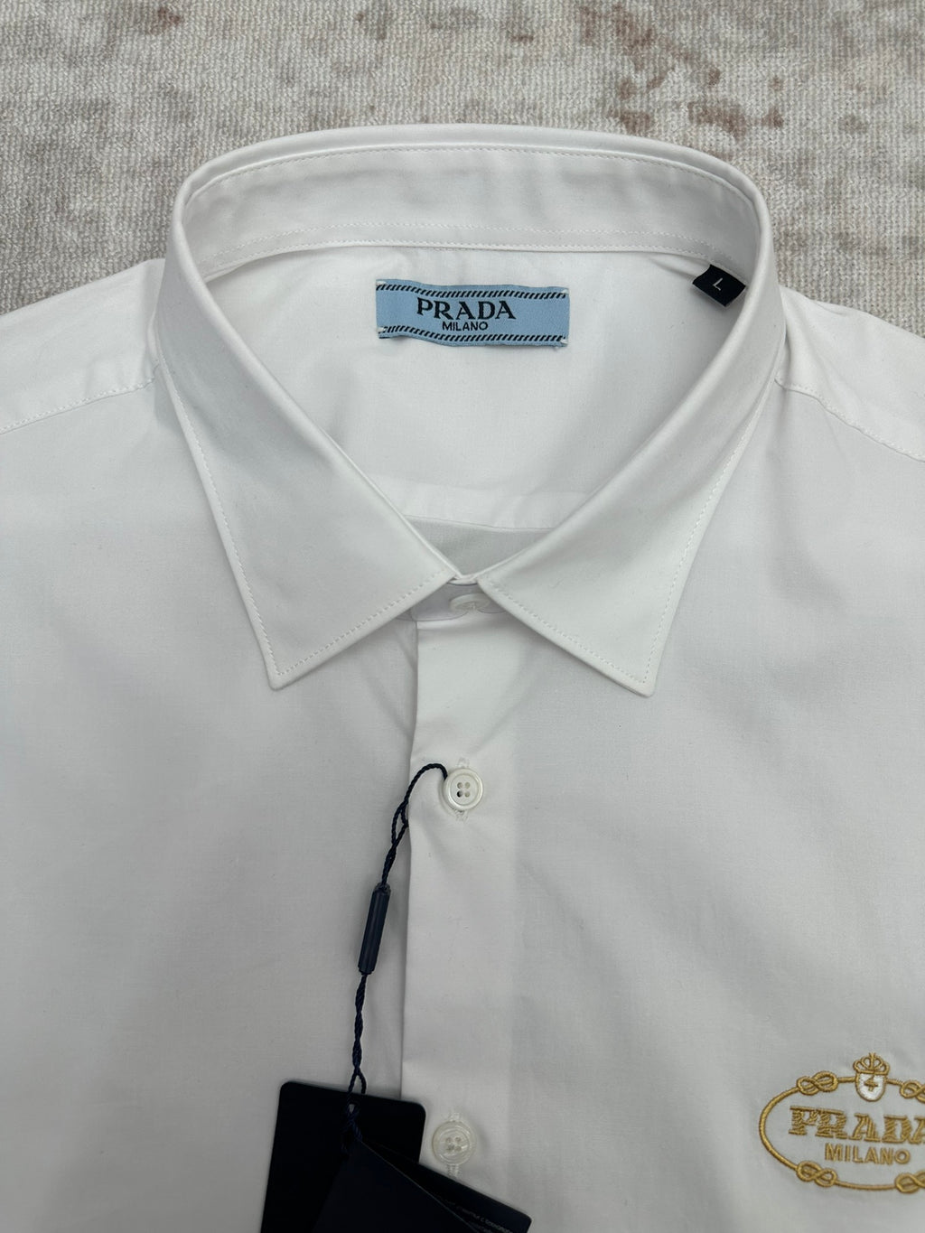 Prada long-sleeve button-up shirt, white, collar and button details with tags