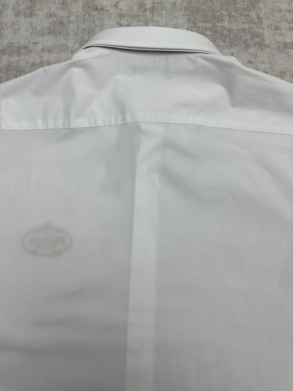 White shirt back yoke with central seam detail
