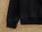 Black jogger pants cuff and hem detail