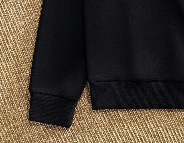 Black jogger pants cuff and hem detail
