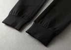 Black jogger pants folded cuff and leg hem detail