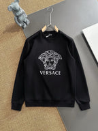 Black crewneck sweatshirt with large Versace Medusa logo print