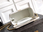 White leather bag opened view with zip top and gold chain strap