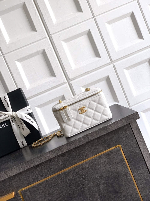Quilted white leather bag with gold chain strap and front flap closure