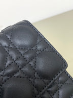 Dior quilted leather bag with diamond stitch pattern, dark navy
