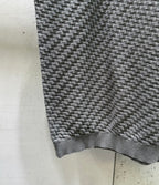 Amiri knit sweater hem and cuff in heather gray with ribbed trim.