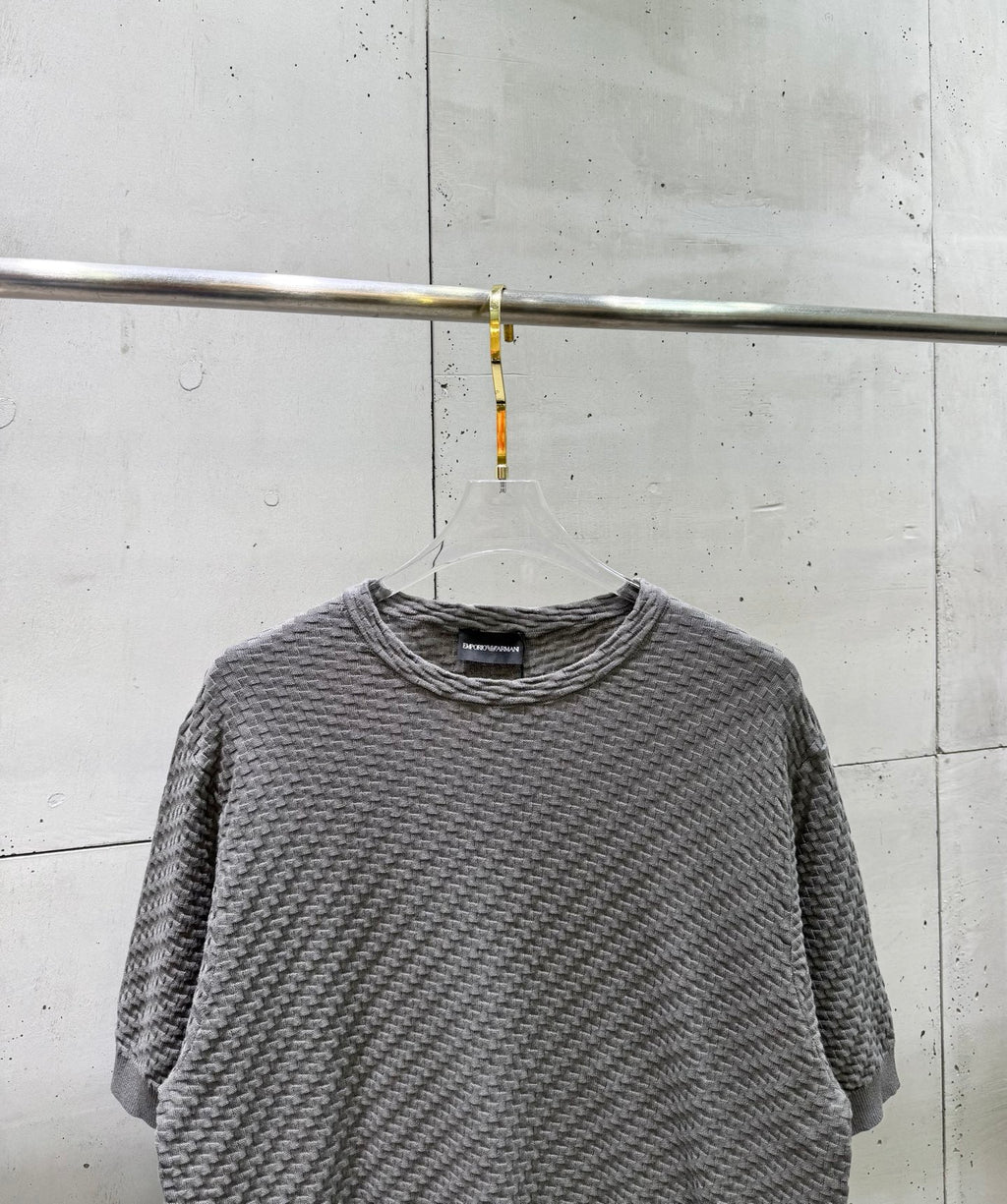 Amiri knit sweater front view in heather gray, crew neck and elbow sleeves.