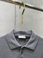 Prada polo shirt close-up neckline, heather gray ribbed collar with button placket