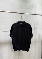 Black short-sleeve polo shirt with button placket and embroidered logo