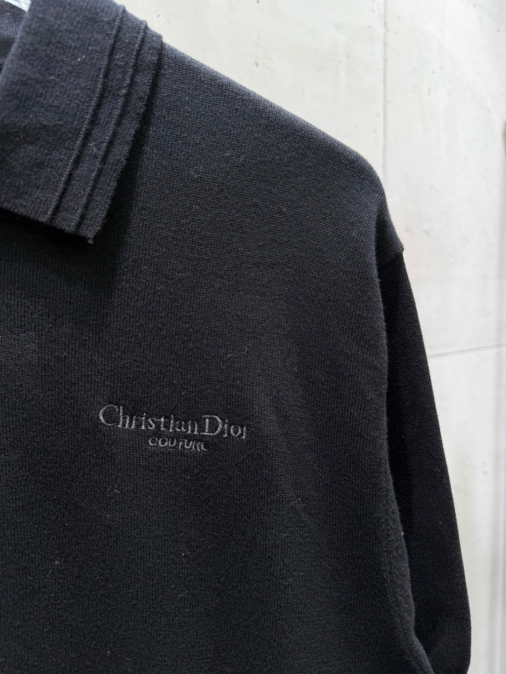 Christian Dior couture logo on black polo knit